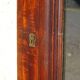 Large antique mirror in a flame mahogany frame; 132x82 cm