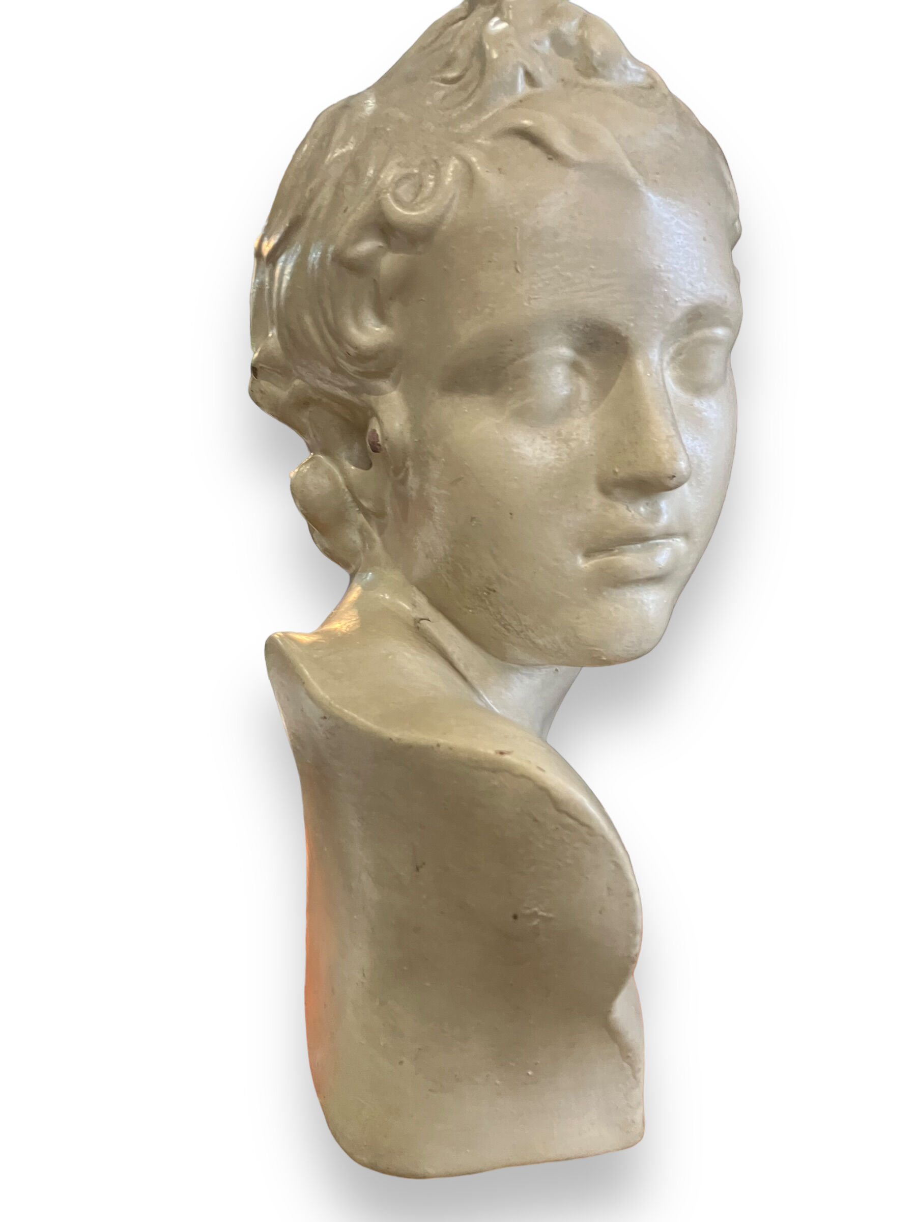Bust of eros in glazed terracotta