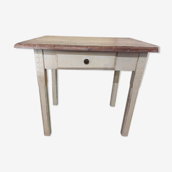 White rectangular and wood table