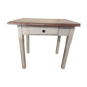 White rectangular and wood table