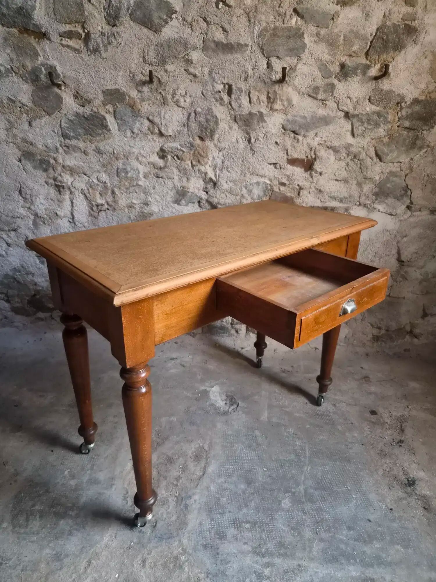 Vintage beech desk with a linoleum top and drawer.