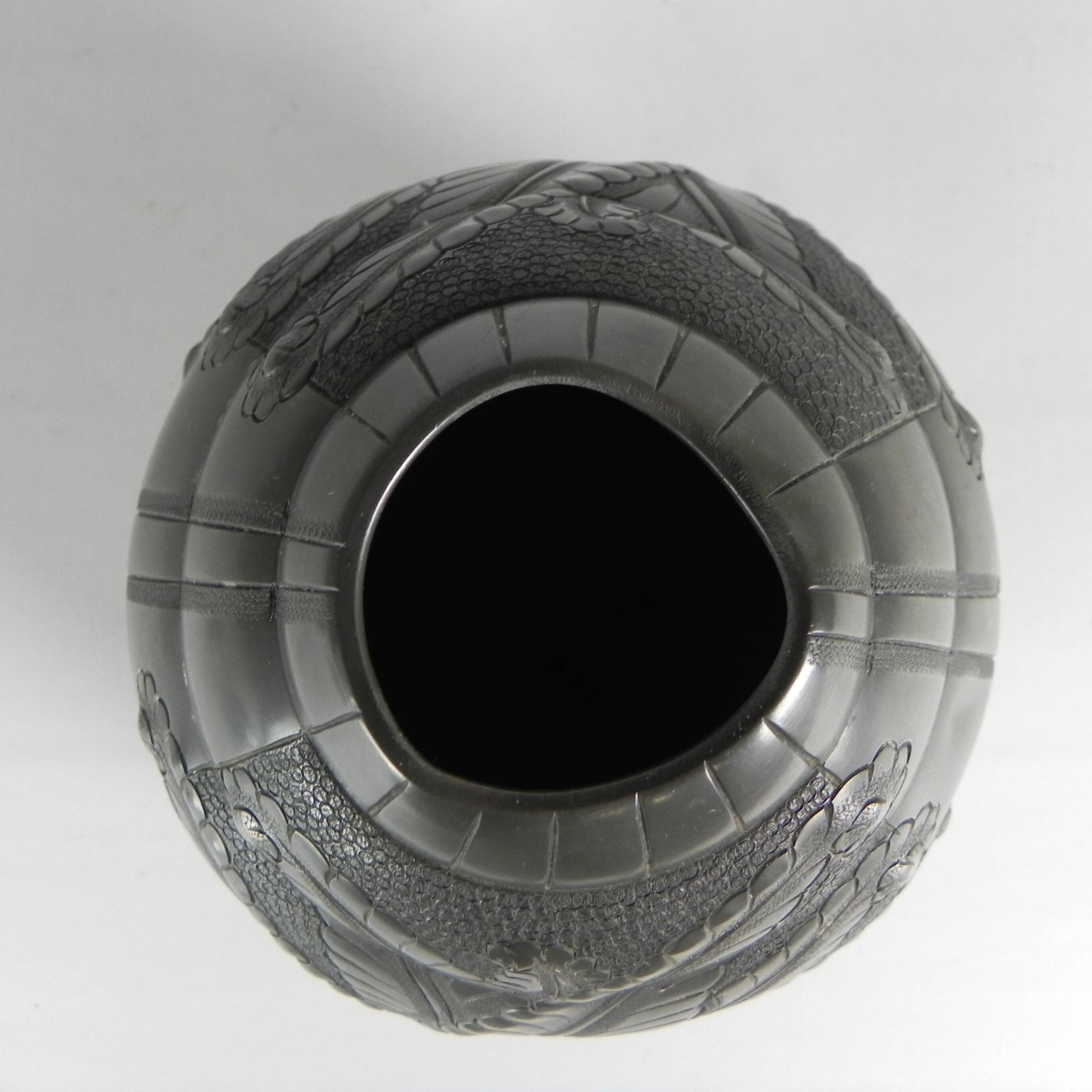 Art Nouveau pewter vase, signed PETIZON, early 20th century.