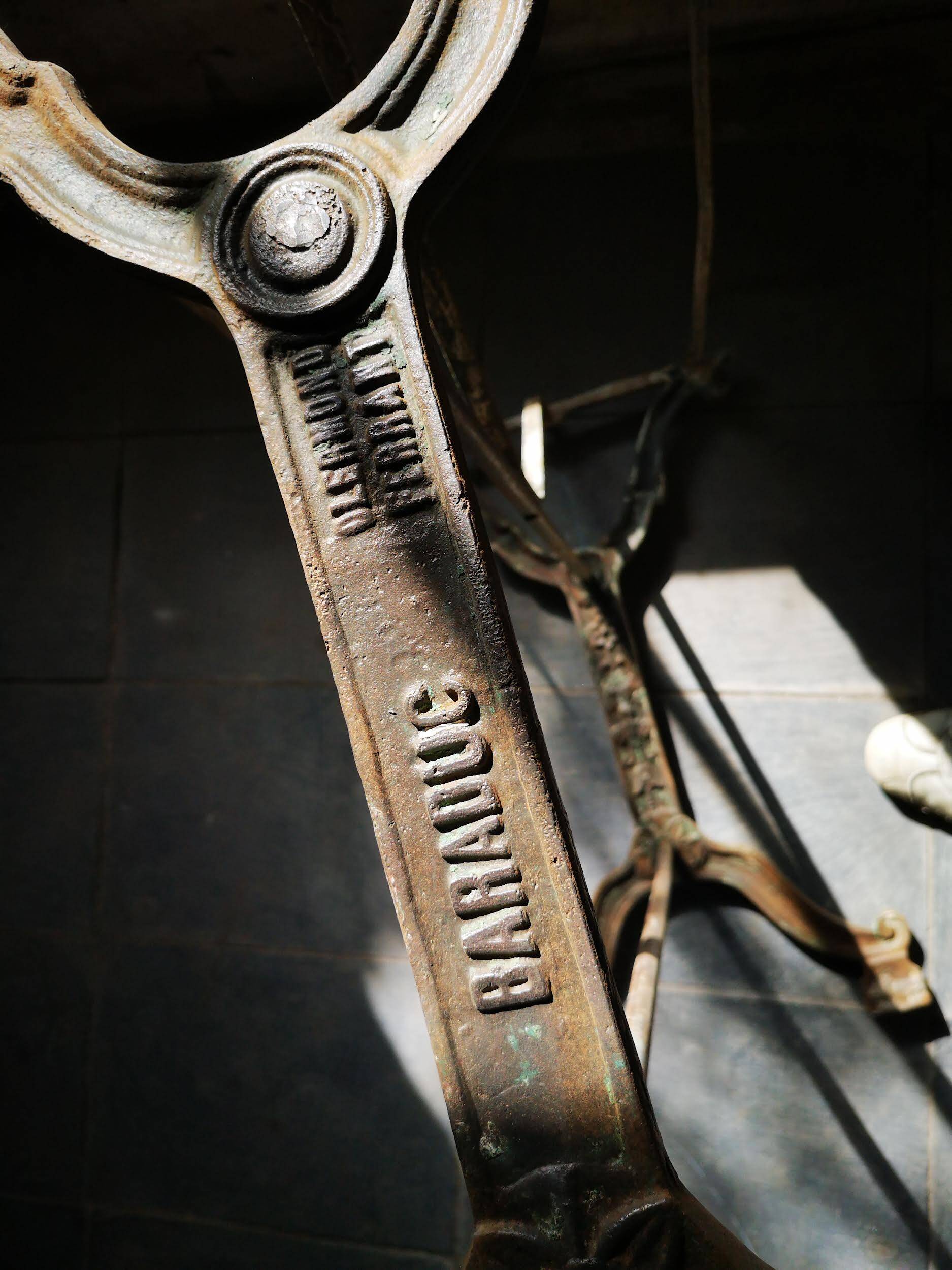 Old bistro table – cast iron legs and natural slate top