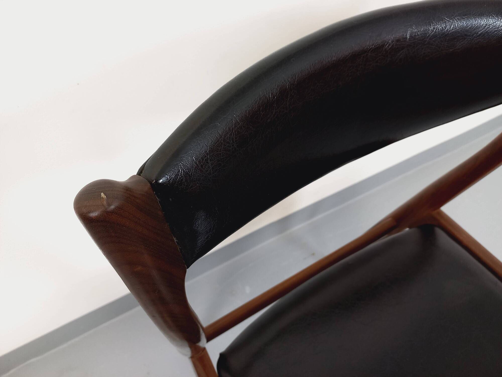 Vintage Scandinavian teak and leatherette chair from the 50s and 60s
