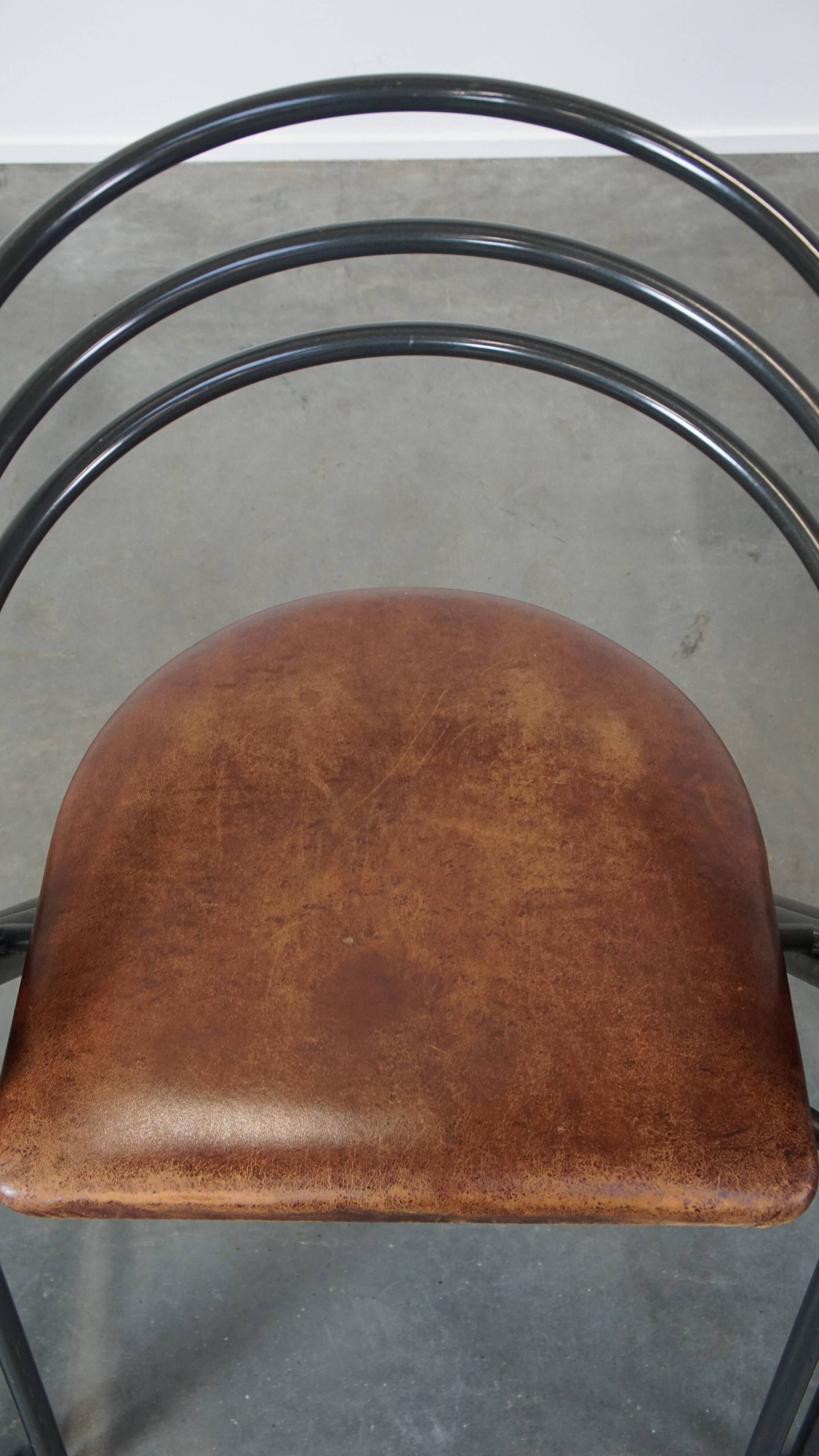 Set of 4 1970s design dining chairs with leather seats and metal frame