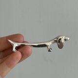 6 dog-shaped knife rests, in silver-plated metal.