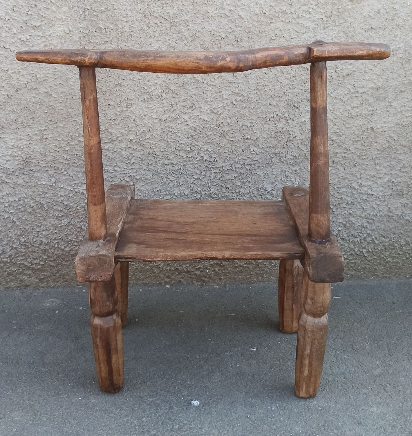 Antique wooden stool. Baoulé African art from Ivory Coast.