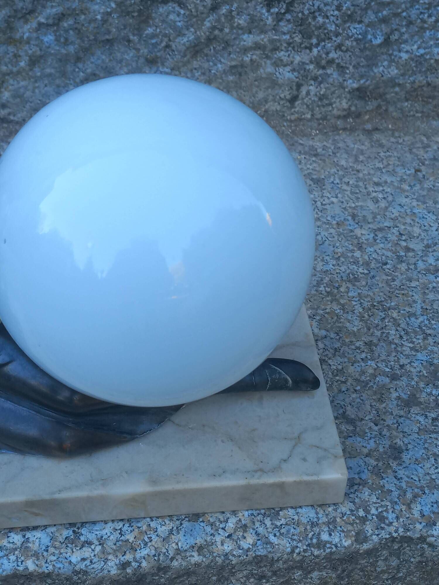 Art Deco lamp in cast iron and marble with a white opaline globe.