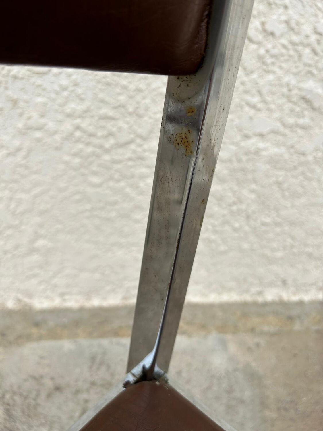 4 vintage leather/iron chairs