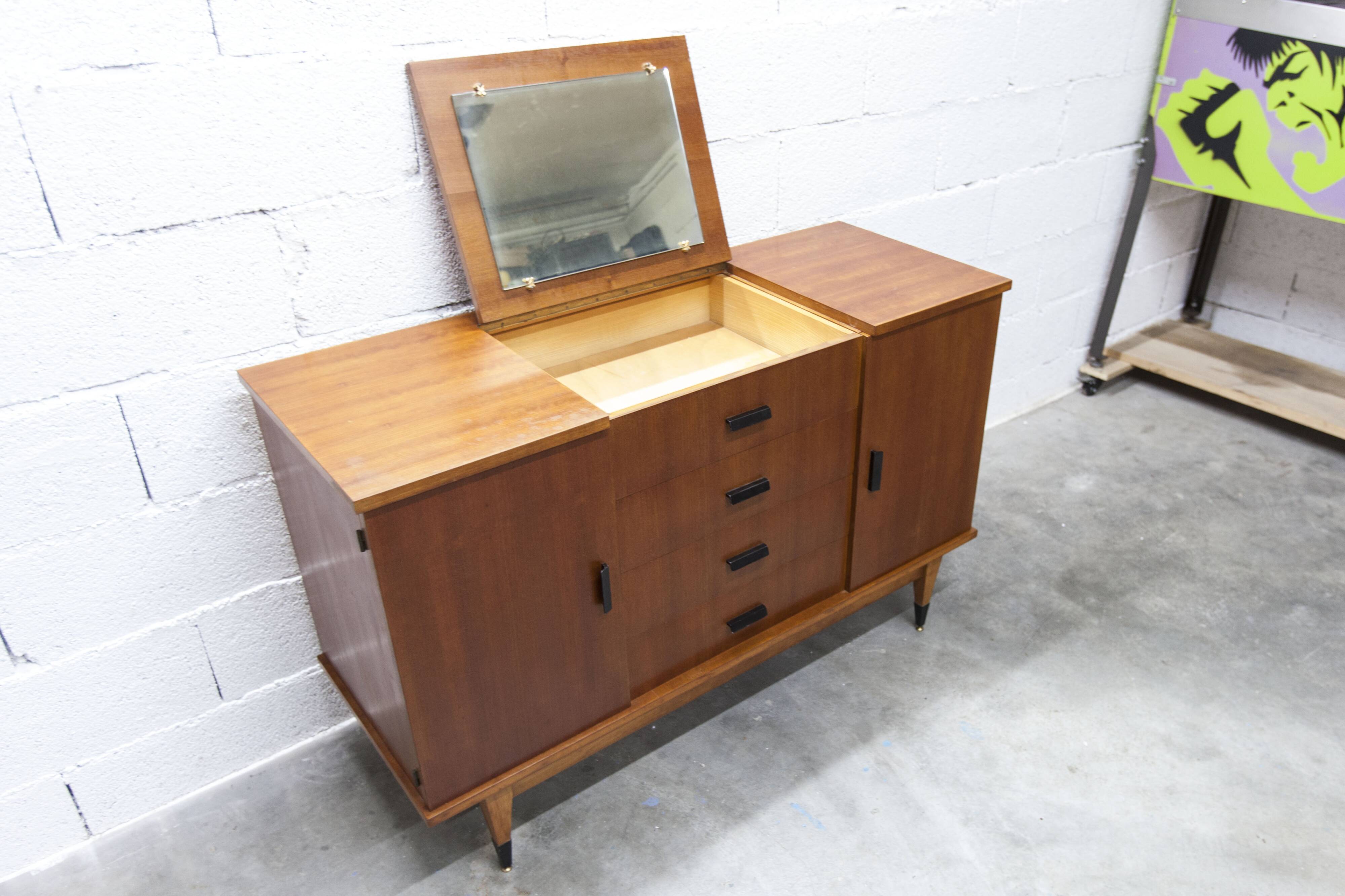1960s teak sideboard with 4 drawers, 2 doors, and a mirror.