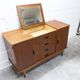 1960s teak sideboard with 4 drawers, 2 doors, and a mirror.