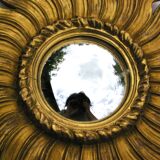 Ancien miroir soleil bombé bois doré "oeil de sorcière"