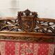 Pair of Gothic-style walnut lounge chairs, 19th century