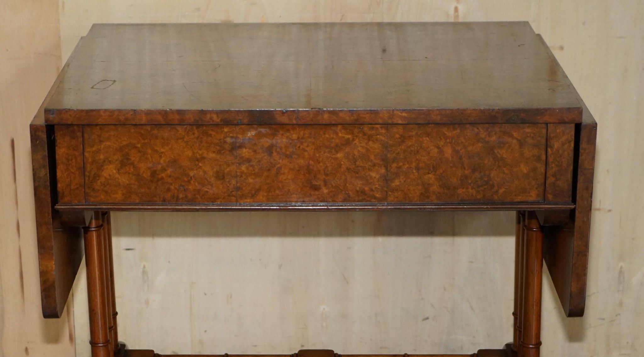 Antique extendable coffee table circa 1880 in solid walnut.