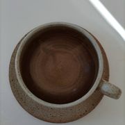 Large stoneware cup and saucer with floral decoration – 1970s
