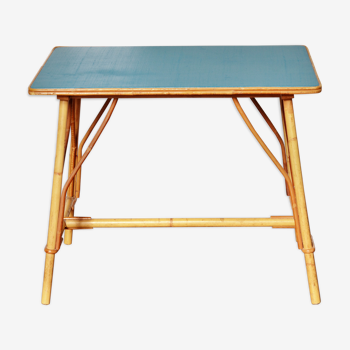 Table basse en rotin bleu Paon