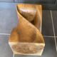 Stool n2 in solid raw walnut wood carved from the mass 1970
