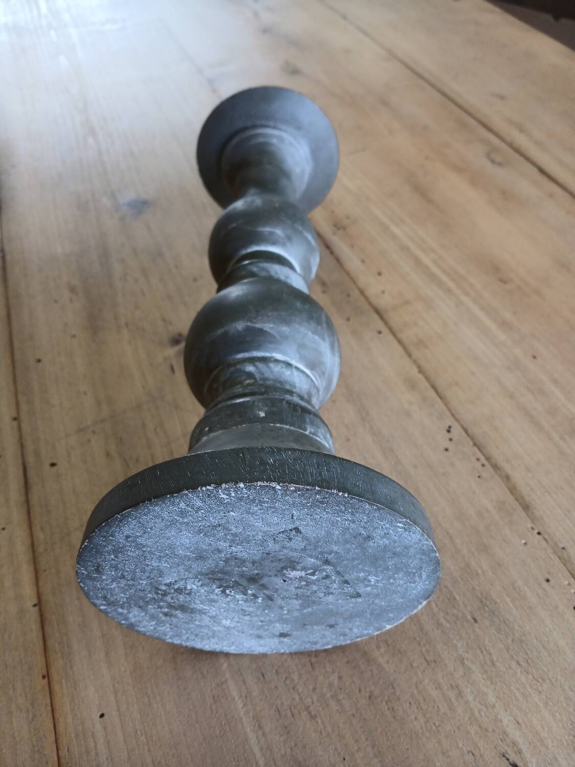 Candle holder in patinated wood