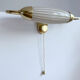 Applique art deco tete de lit, forme dirigeable, laiton opaline