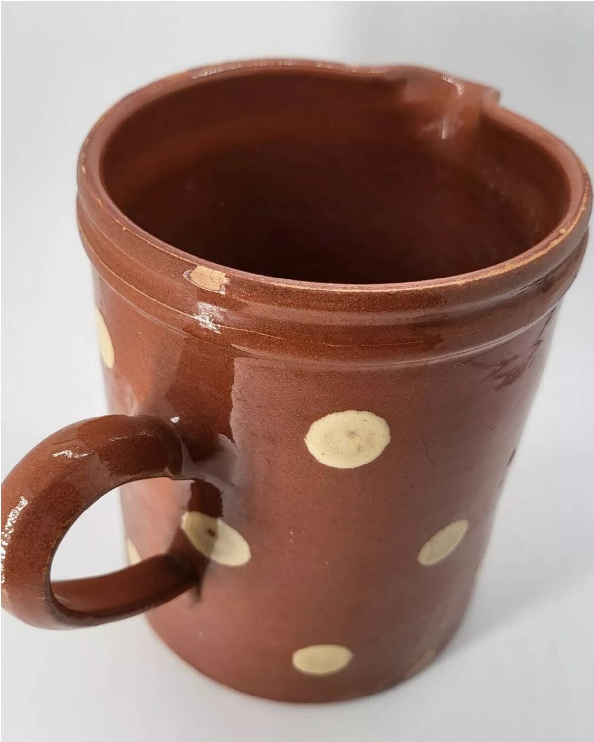 Old pitcher with polka dots savoyard pottery in glazed terracotta alsace