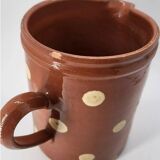 Old pitcher with polka dots savoyard pottery in glazed terracotta alsace