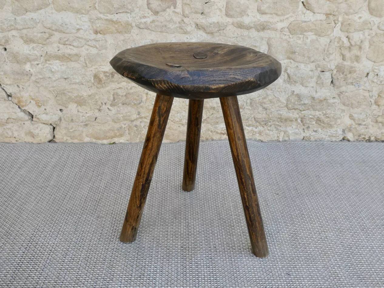 Tripod stool made of carved solid wood, handcrafted, around 1950.