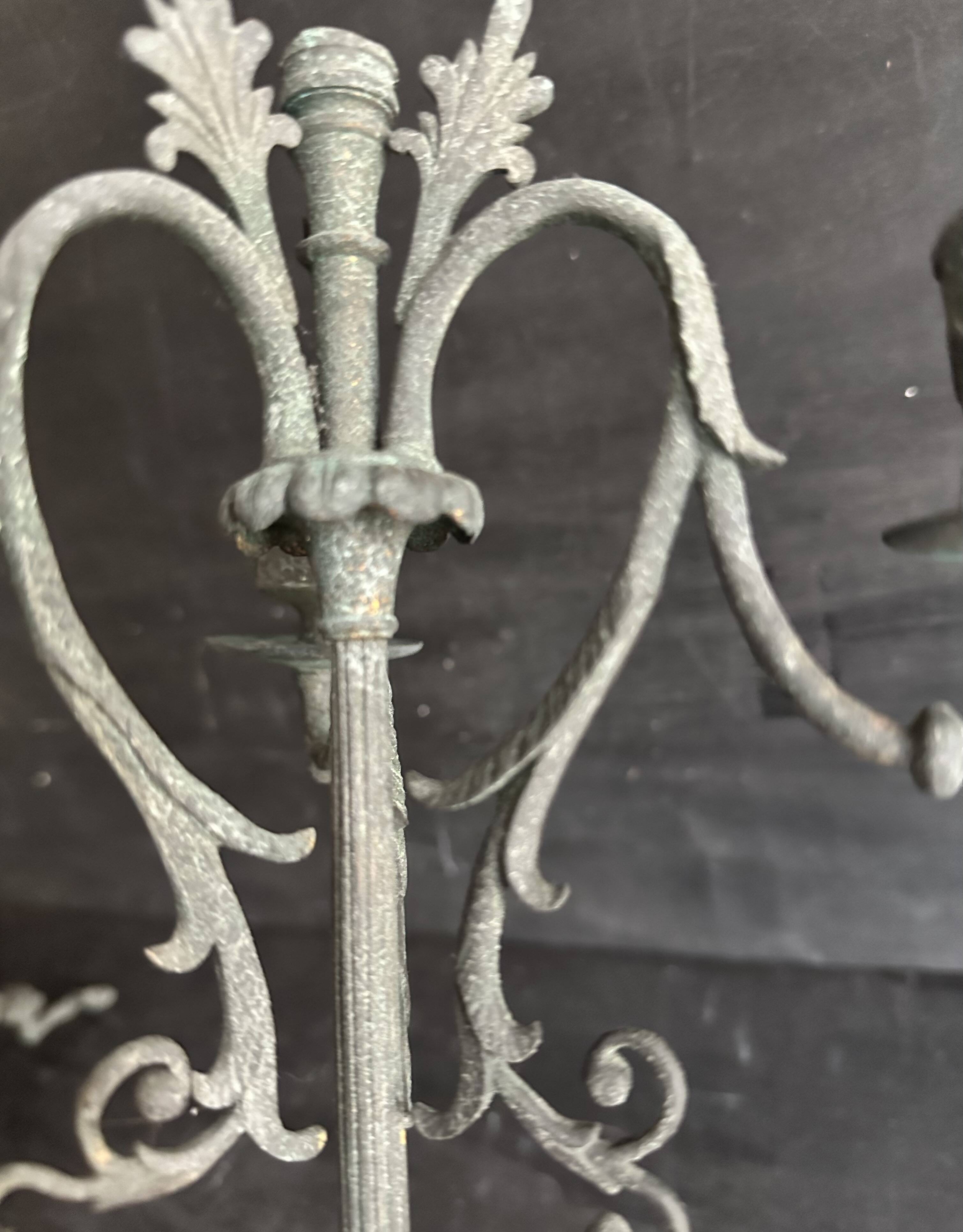 Pair of large Napoleon III candlesticks in patinated bronze