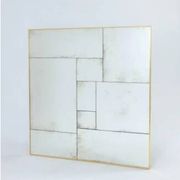 Handcrafted industrial mirror made to measure with a hand-aged frame and brass finish.