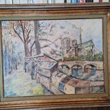 Oil painting depicting the Quai de Seine and booksellers.