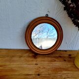 Round mirror in vintage wood