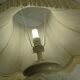 Pair of relief enameled porcelain lamps, Asian motif