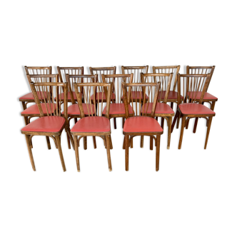 Série lot de 14 chaises bistrot bar restaurant café estampillées Baumann en hêtre assise skaï rouge
