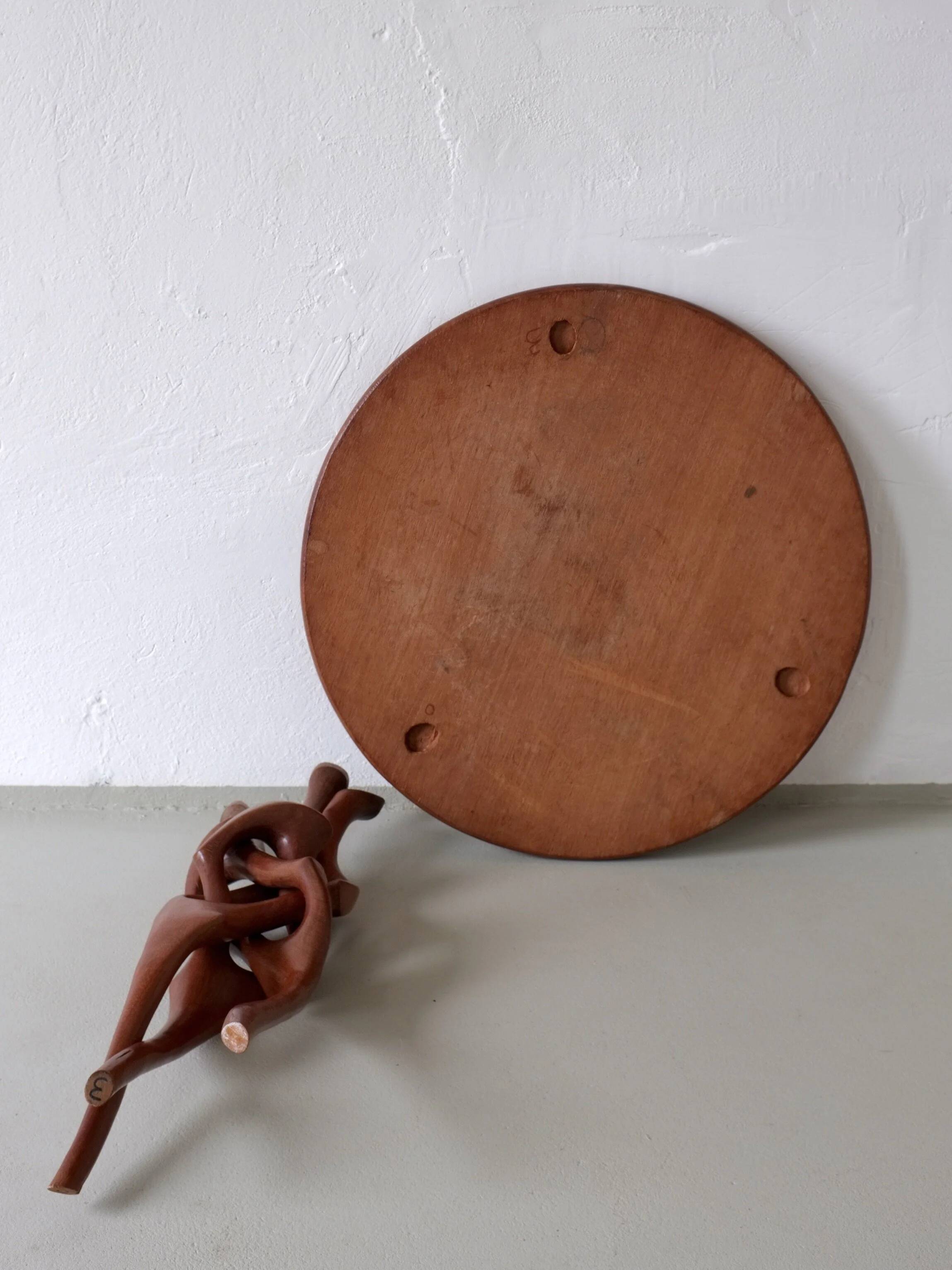 Sculptural carved teak side table | 1960s