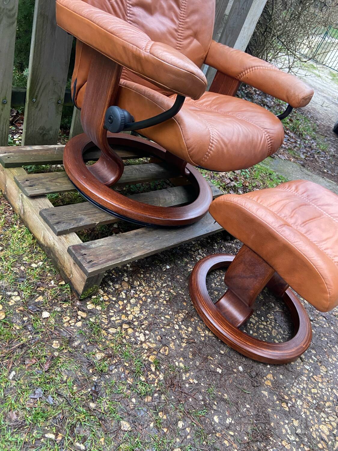 Stressless armchair and footrest set from the 70s/80s.