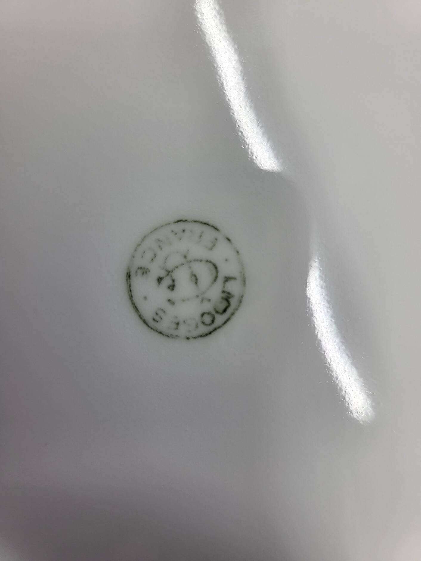 Limoges porcelain plates with green border and gold and blue flower decoration, French set of 8