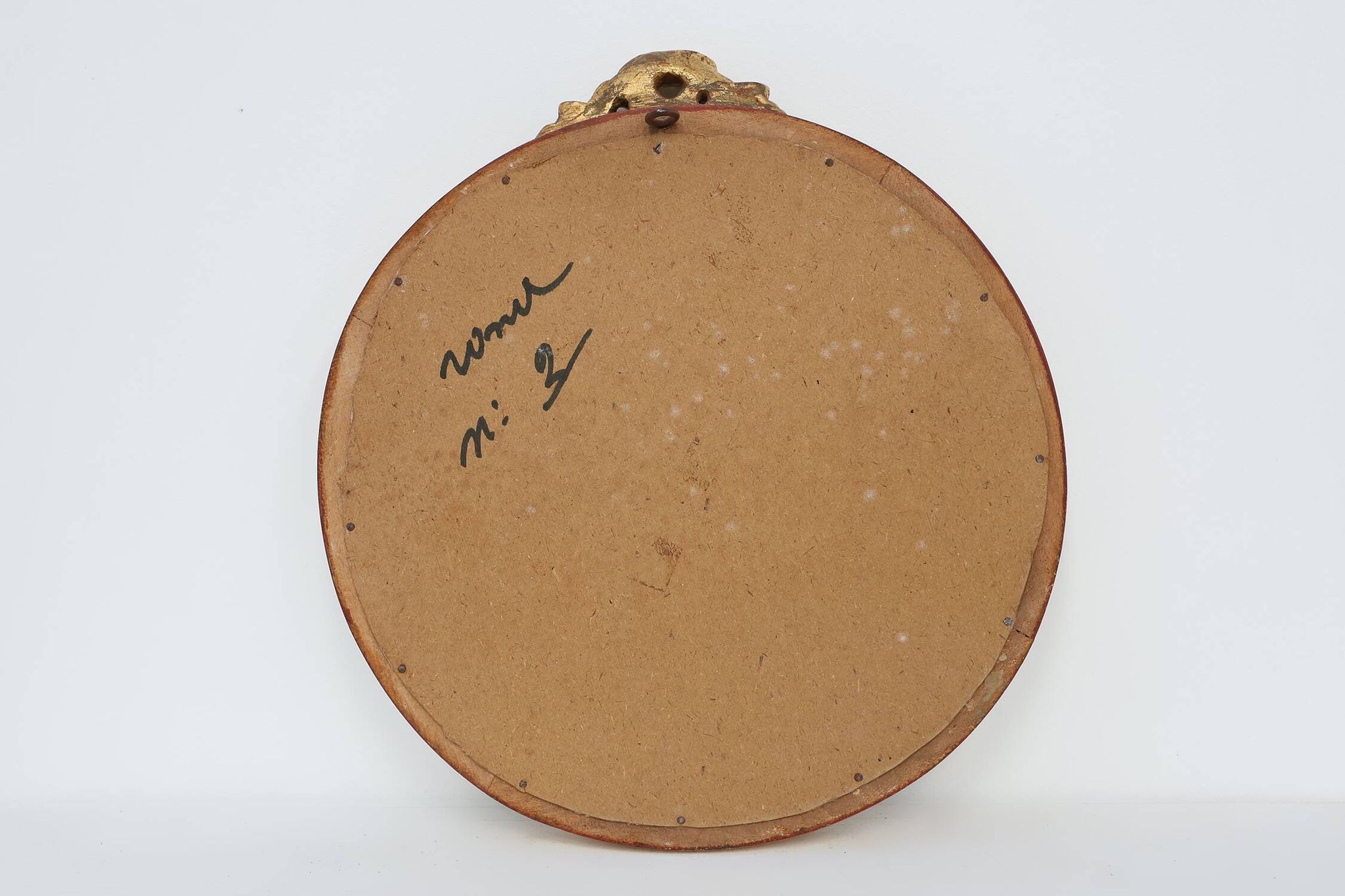 Oval giltwood mirror with rococo-style floral crest, mid-20th century