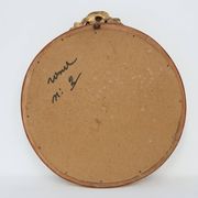 Oval giltwood mirror with rococo-style floral crest, mid-20th century