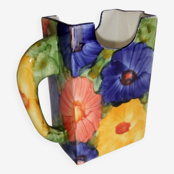 Ceramic vase pitcher decorated with flowers