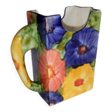 Ceramic vase pitcher decorated with flowers