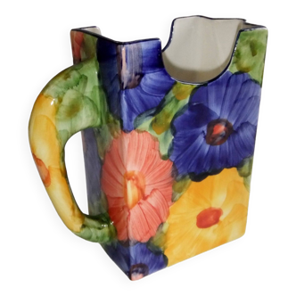 Ceramic vase pitcher decorated with flowers