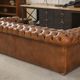 Tan leather tufted Chesterfield sofa