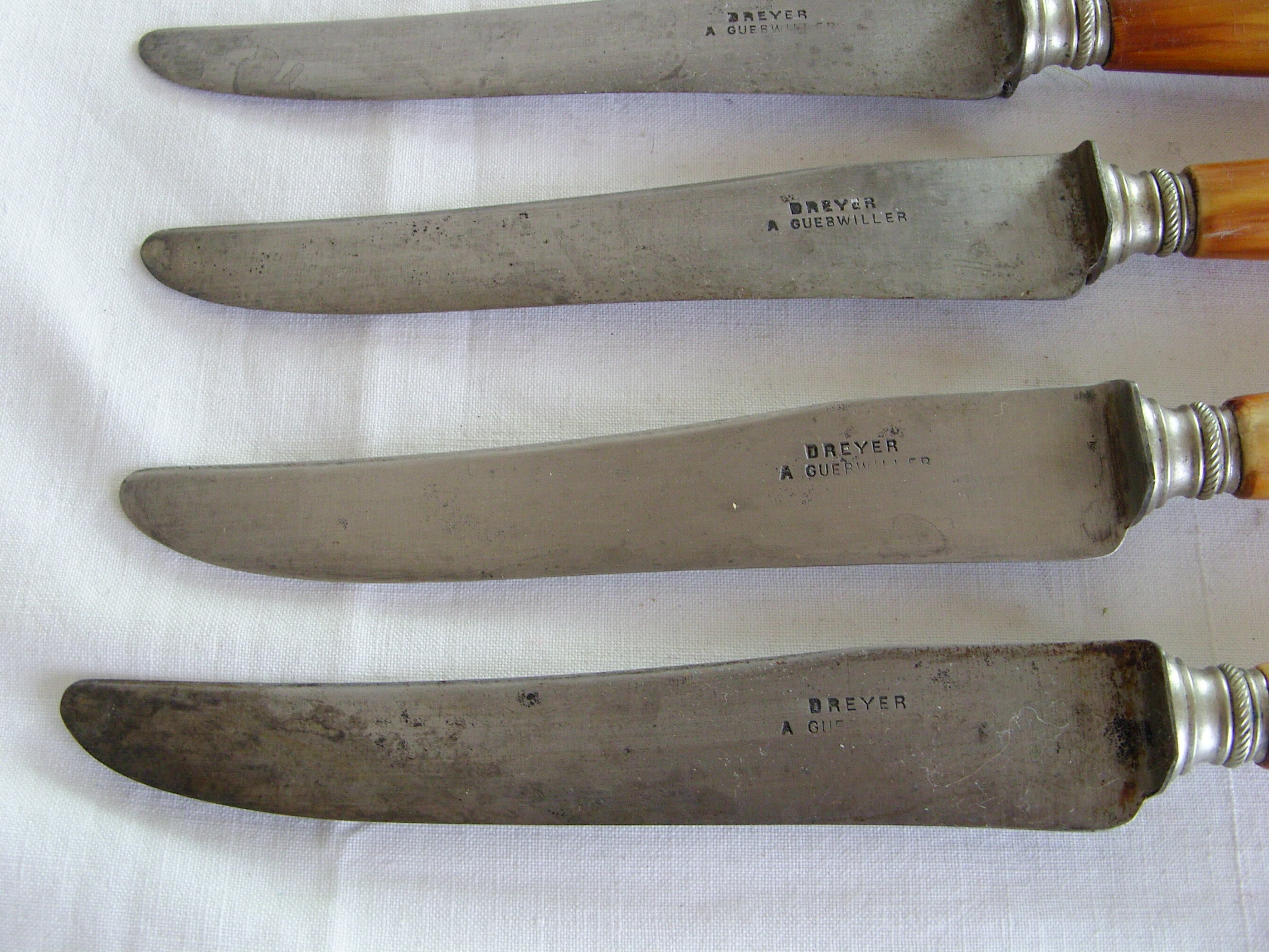12 old large table knives