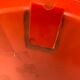 Vintage orange wall mirror from the 60s