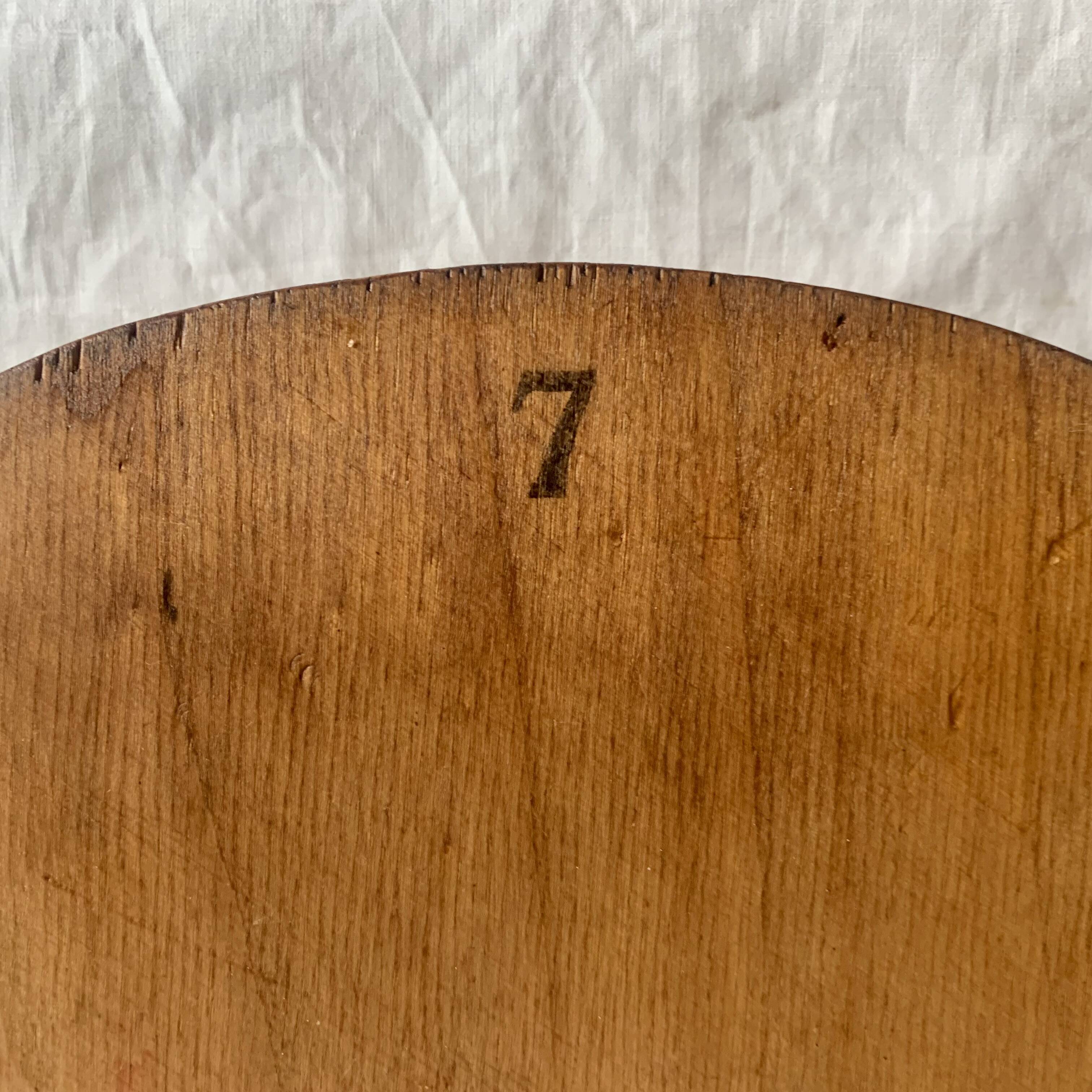 Art Deco wooden wall coat rack with round central mirror