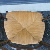 Pair of blackened wooden armchairs