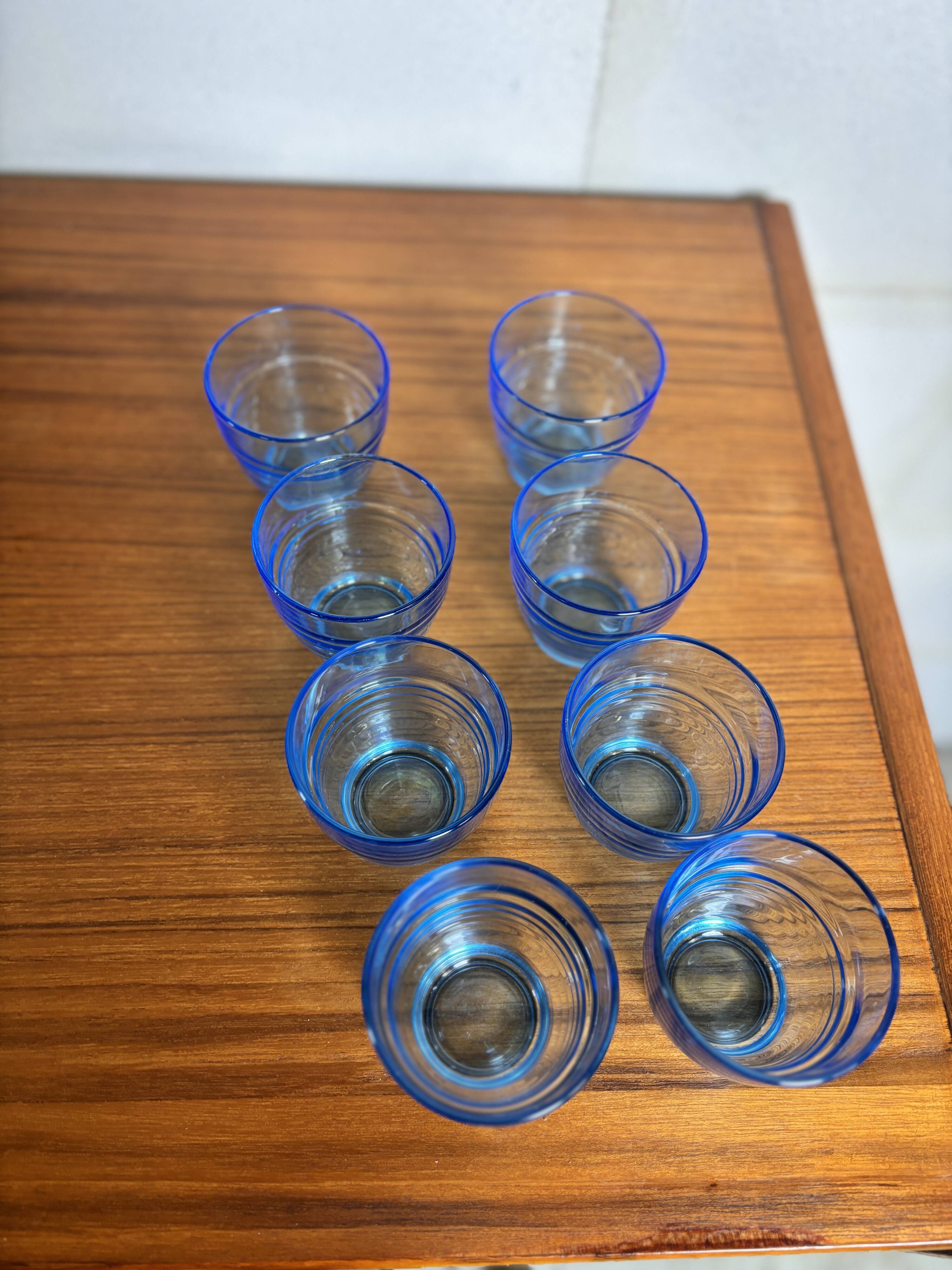 Set of 8 blue Arco France glasses.