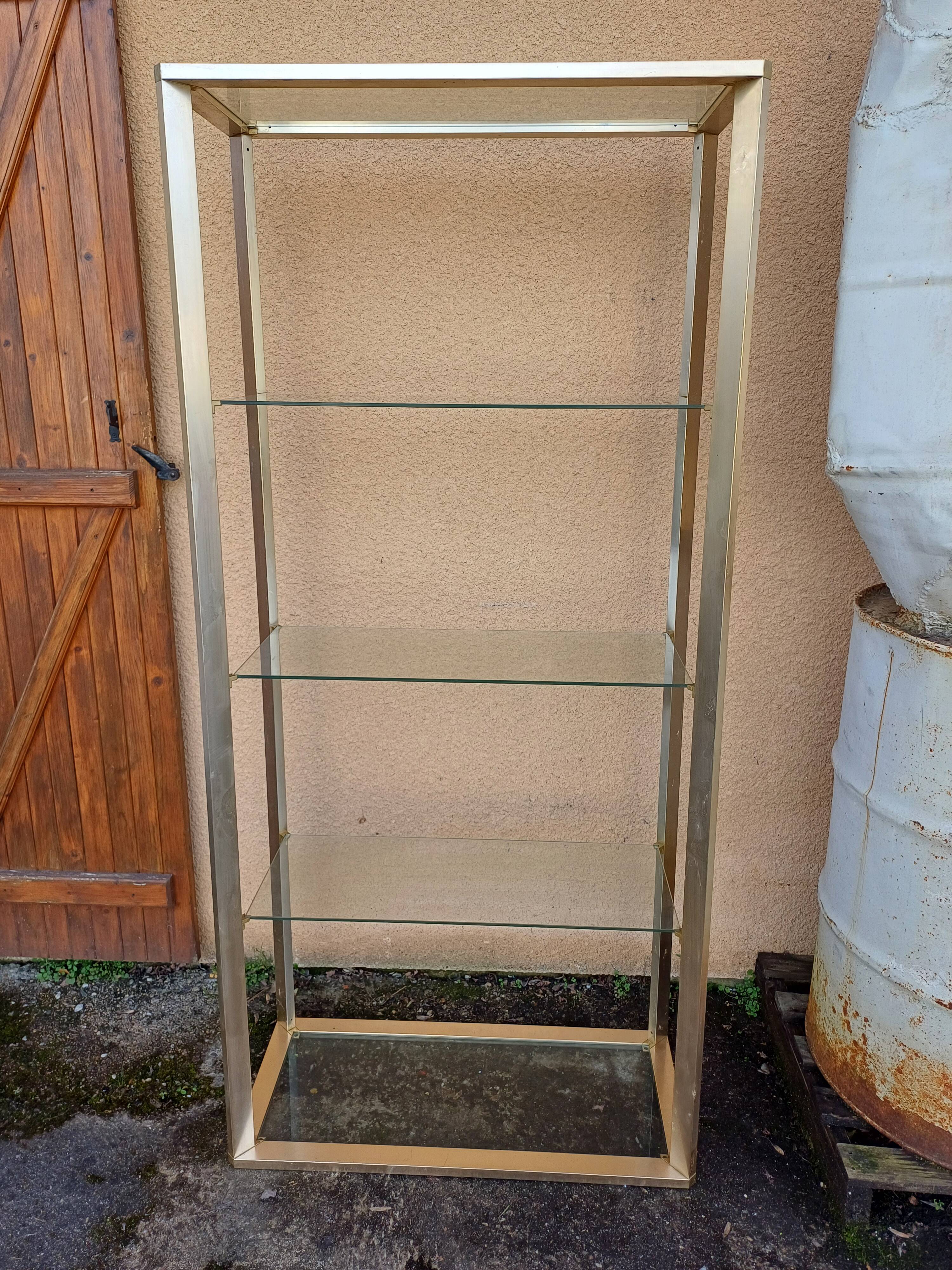 Vintage shelving unit in gold aluminum and glass