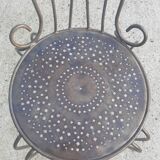 Bent metal chair