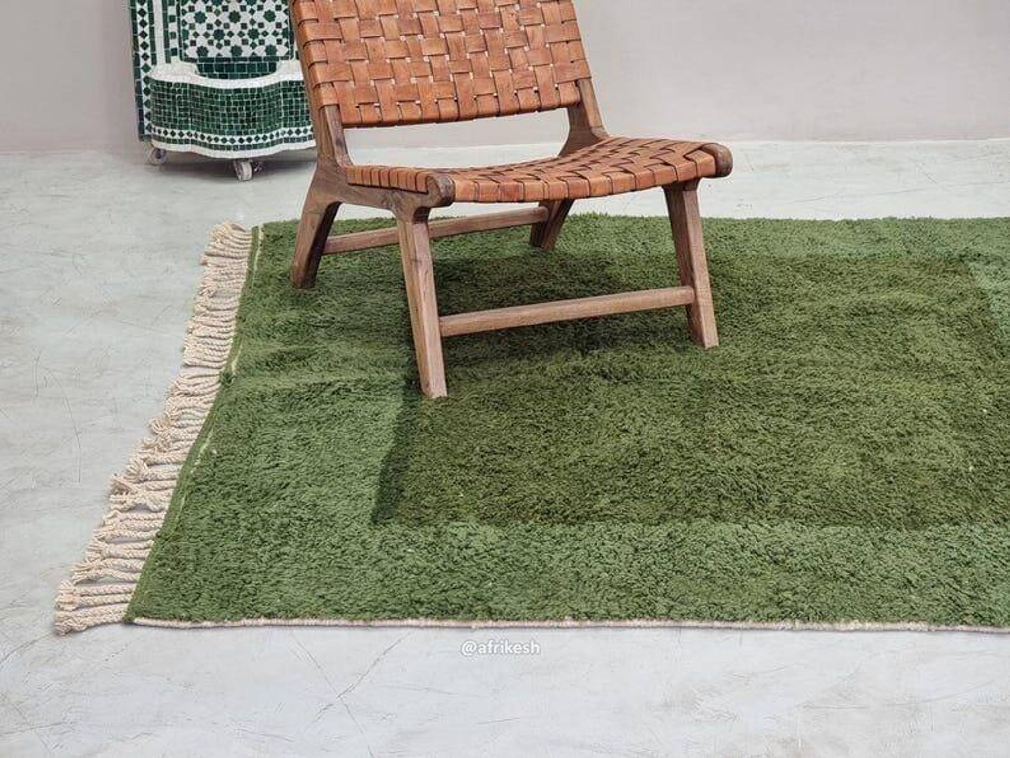 Traditional handwoven green Moroccan wool rug