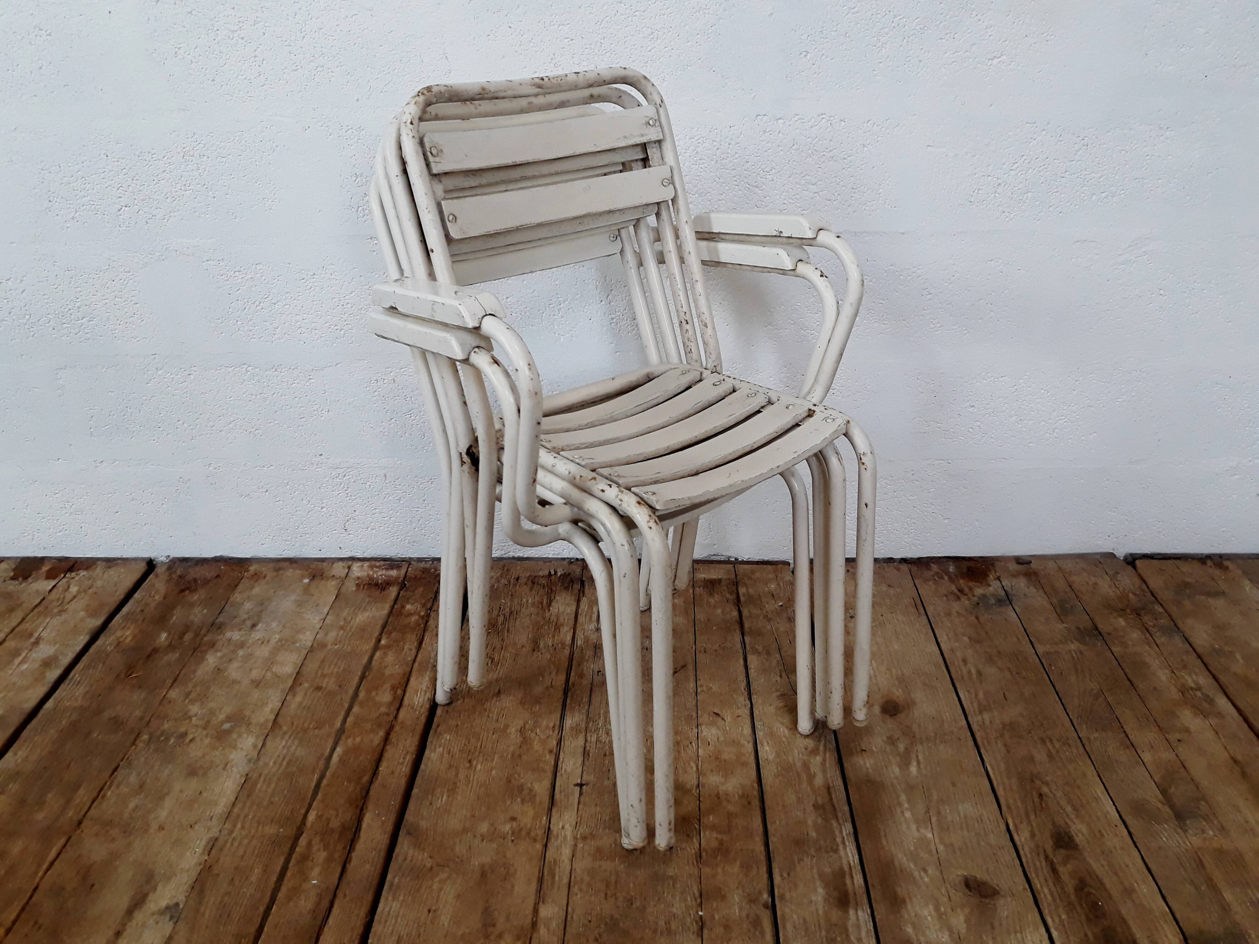 4 chairs and armchairs by Tolix